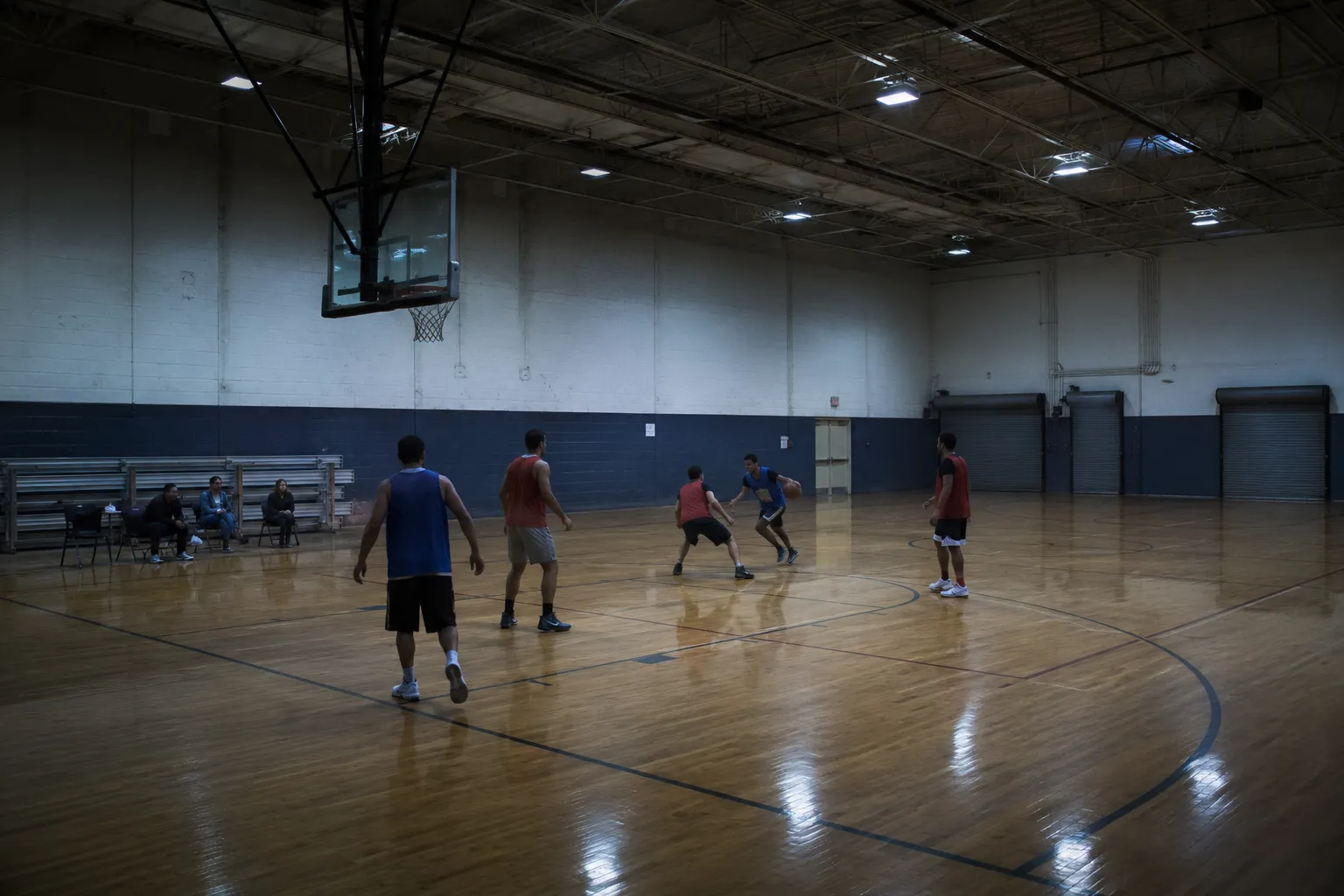 Amateur basketball game in a community gym, the environment the automated stat tracking pipeline reads