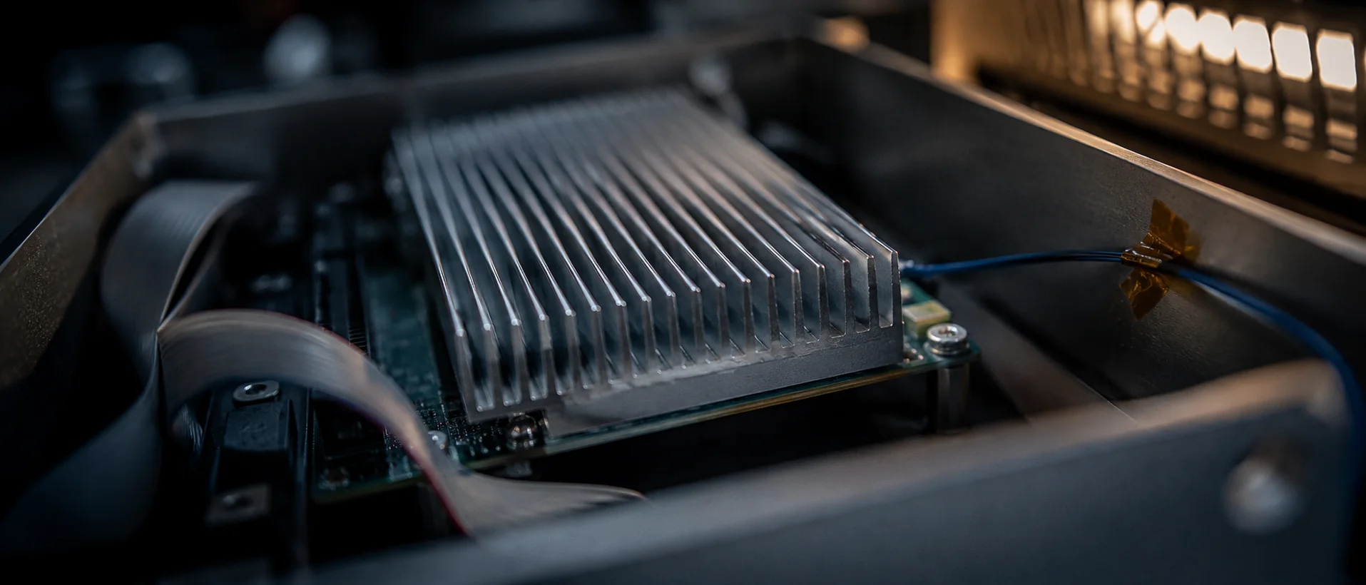 Compute board with a heatsink packed into a sealed enclosure, the thermal limit for edge AI inference